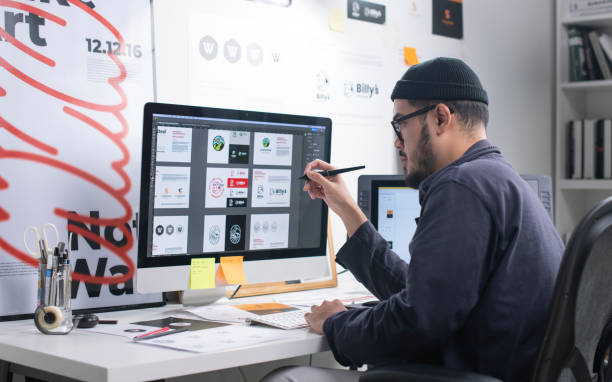 Professional graphic designer in Cameroon working on a branding project